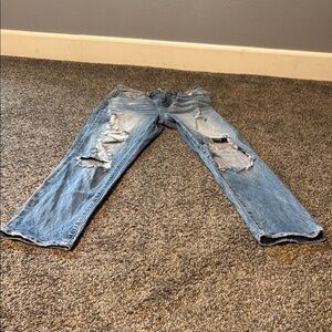 Buckle Women's High Rise Distressed Blue Jeans